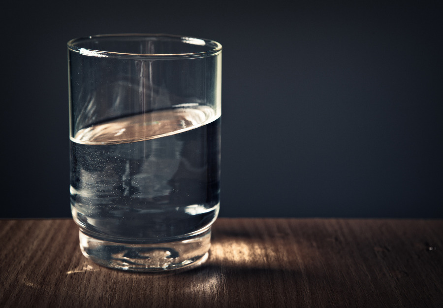 A glass of water on a table